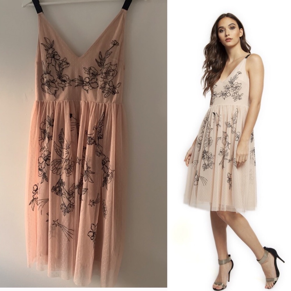Tattoo Express dress. Lace overlay and embroidery